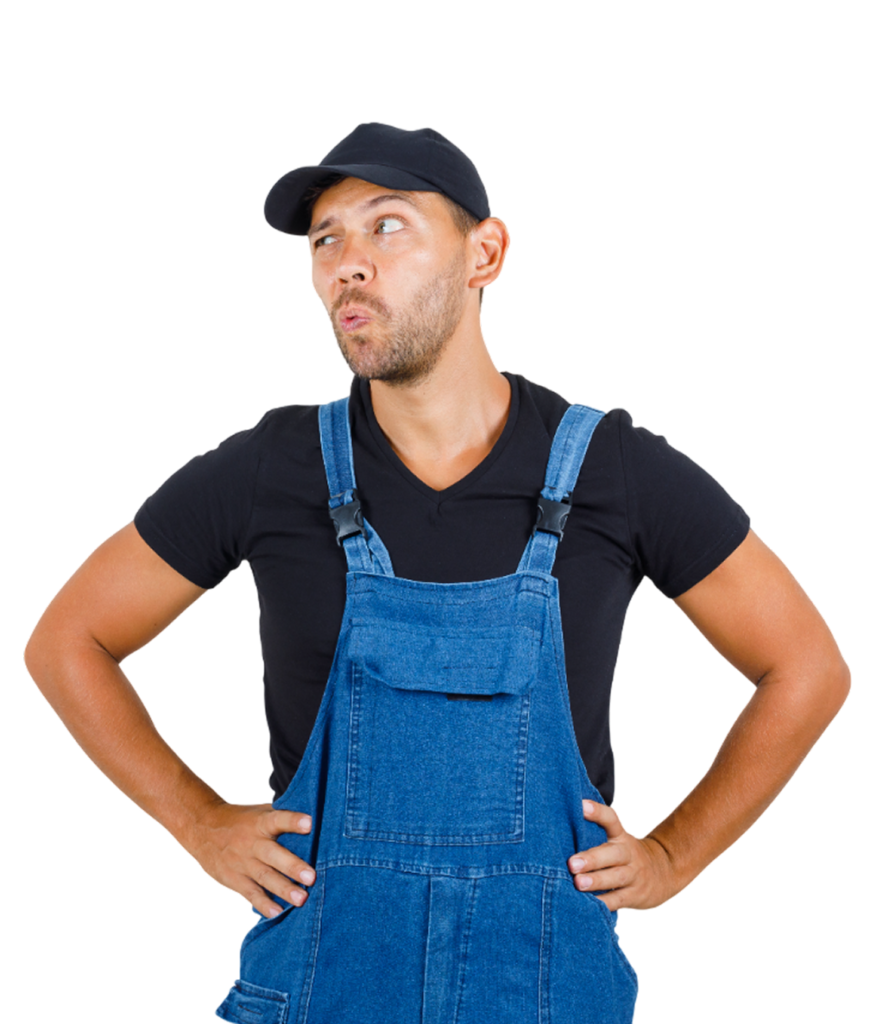 High Security Lock Upgrades Bellerose NY young mechanic looking aside with hands waist uniform looking pensive wearing black hat