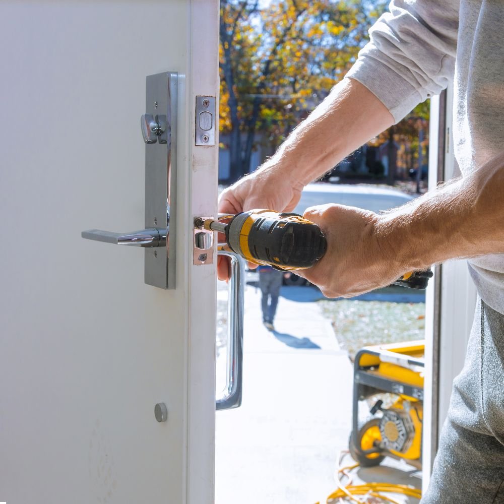 high security lock installation man installing high security lock